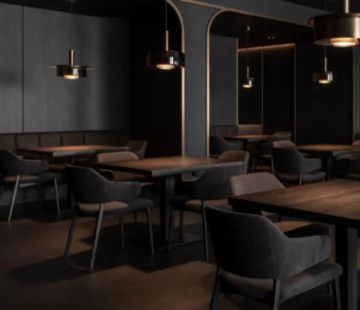 Warm interior ambience with smoked timber, pendant lighting and softly lit tables.